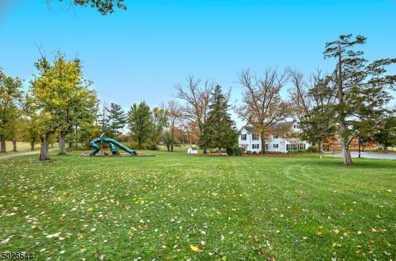 1815 Burnt Mills Road Bedminster, NJ 07921 - Photo 27 of 27 a view of a field with large trees