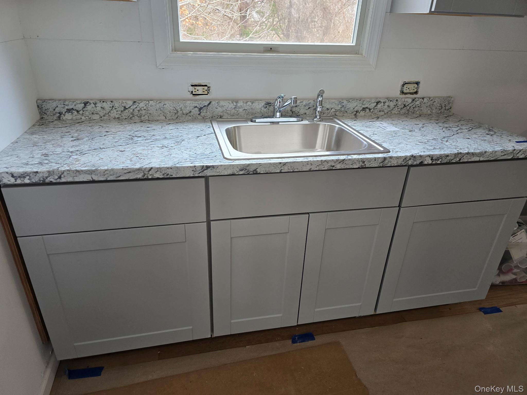 310 A Frowein Road Center Moriches, NY 11934 - Photo 3 of 5 a close view of sink and tap