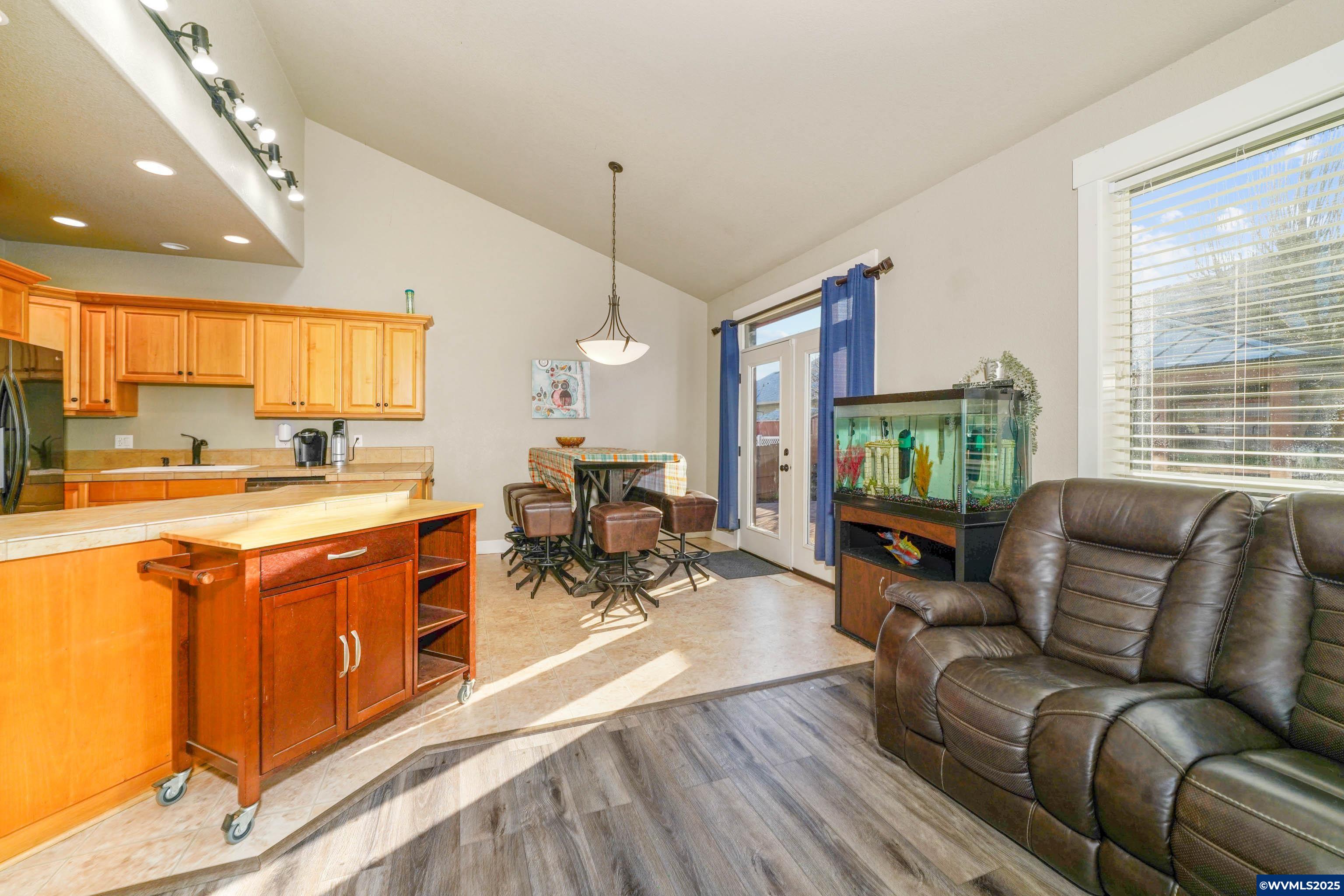 353 Northwest Reed Lane Dallas, OR 97338 - Photo 14 of 45 a living room with furniture and a flat screen tv