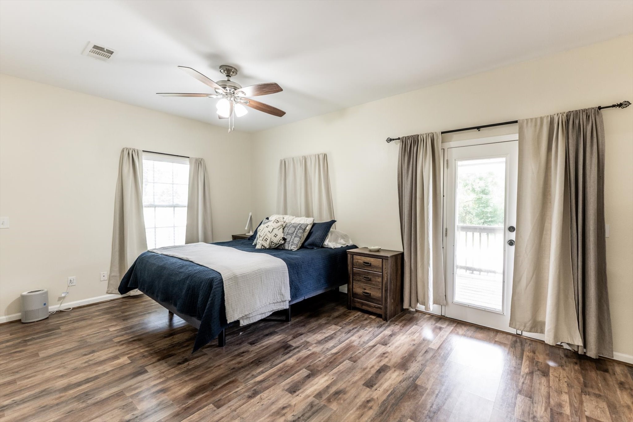 50 Canary Street Point Blank, TX 77364 - Photo 19 of 33 a bedroom with a bed and a window