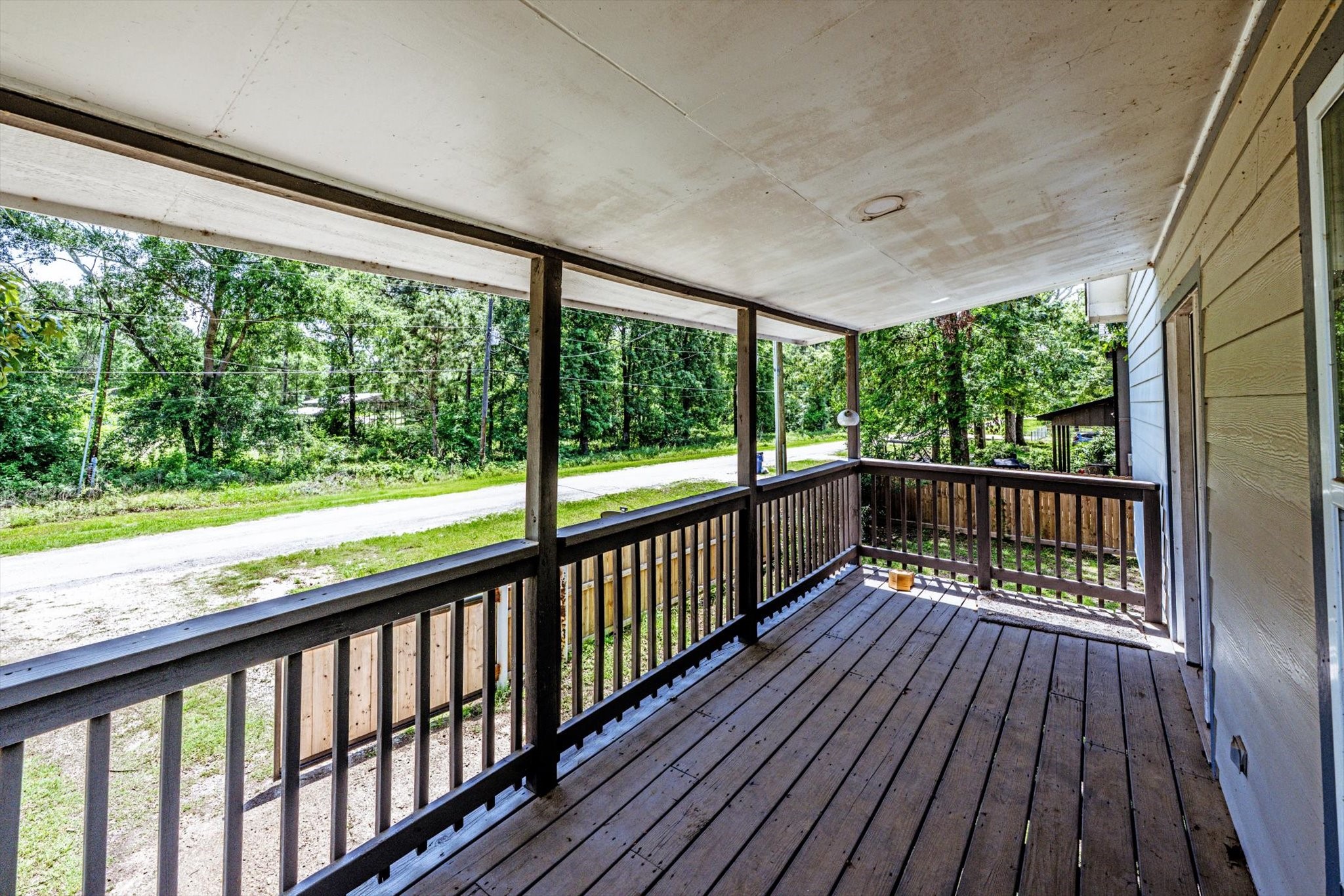 50 Canary Street Point Blank, TX 77364 - Photo 30 of 33 a view of balcony with wooden floor