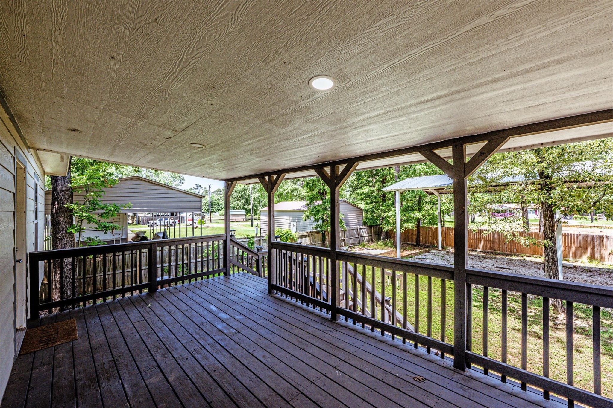 50 Canary Street Point Blank, TX 77364 - Photo 33 of 33 a view of a balcony with wooden floor