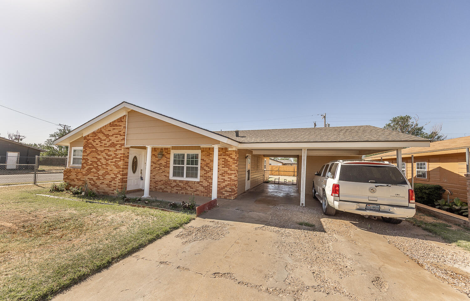 1724 East 2nd Street Lubbock, TX 79403 - Photo 1 of 20 a view of a house with a yard