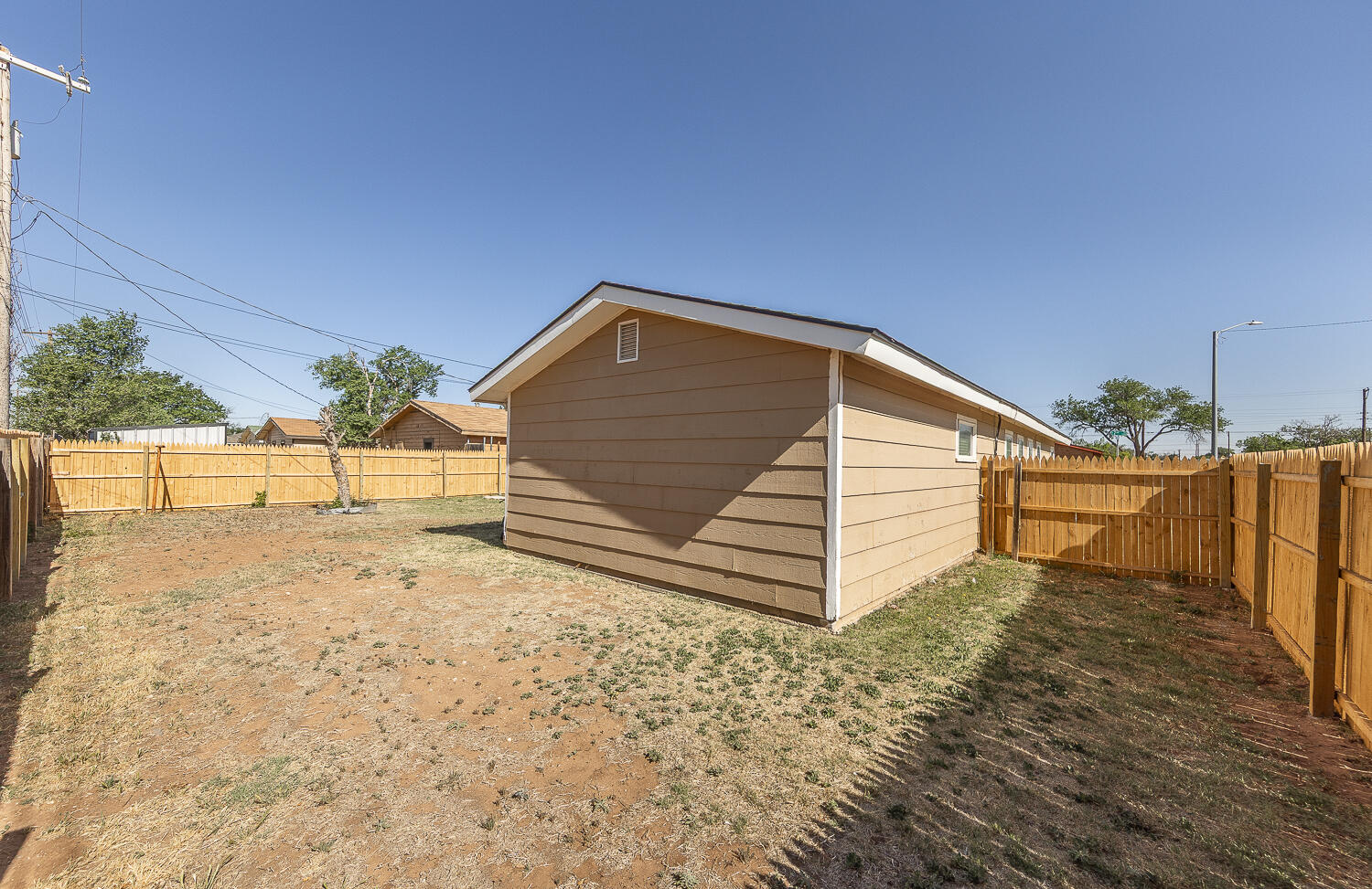 1724 East 2nd Street Lubbock, TX 79403 - Photo 17 of 20 a view of a backyard