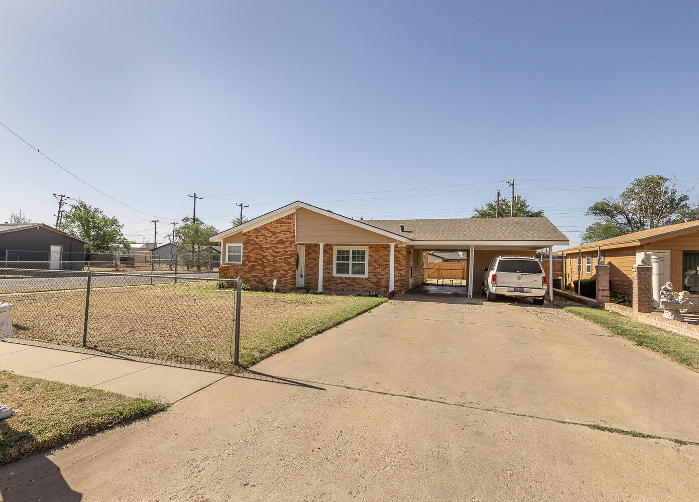 1724 East 2nd Street Lubbock, TX 79403 - Photo 20 of 20 a front view of a house with a yard