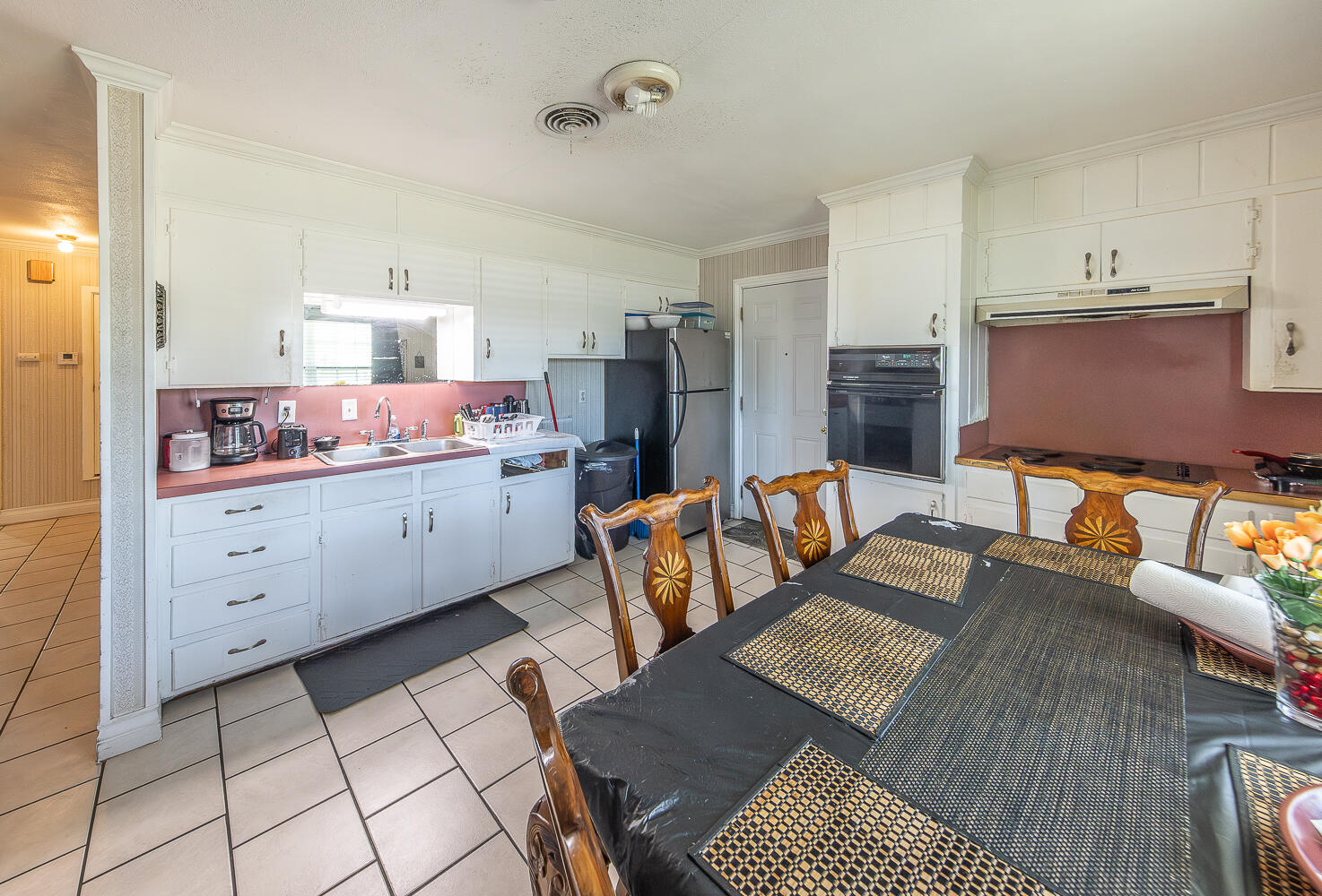 1724 East 2nd Street Lubbock, TX 79403 - Photo 6 of 20 a large kitchen with cabinets