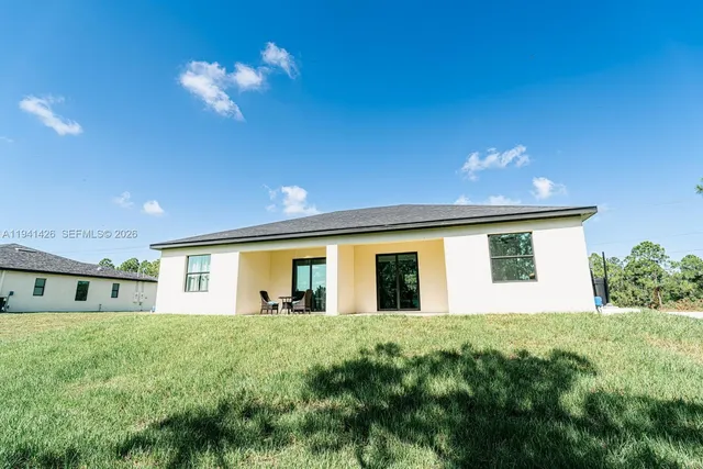 a front view of house with yard