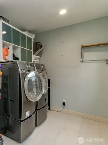 a storage room with washer and dryer