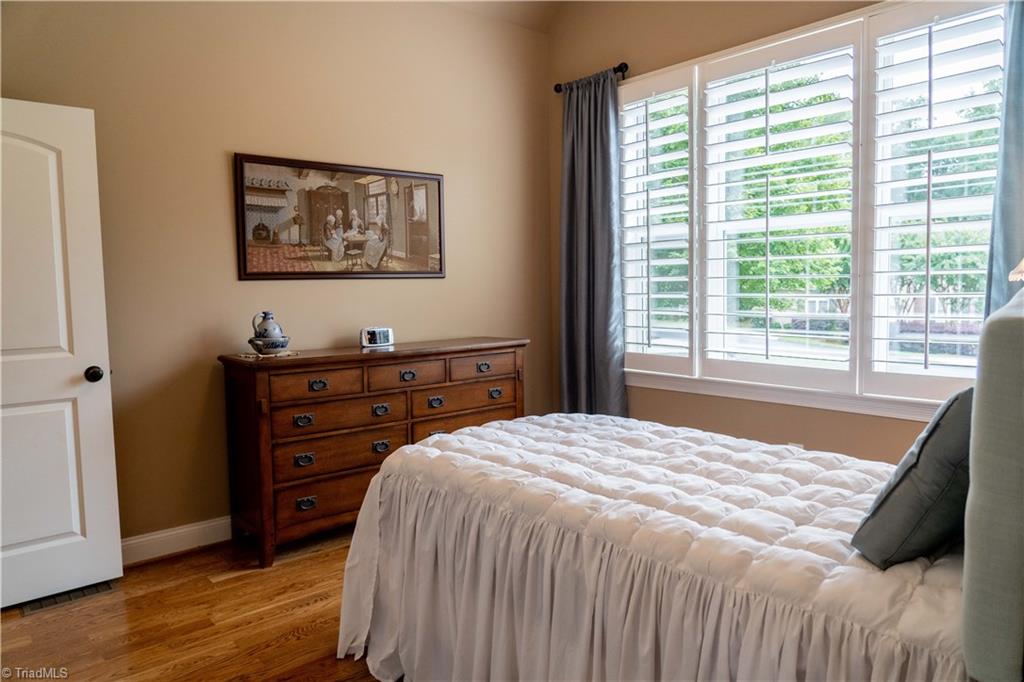 5688 Pepper Road Oak Ridge, NC 27310 - Photo 22 of 31 Downstairs Bedroom 2 with Full Bath