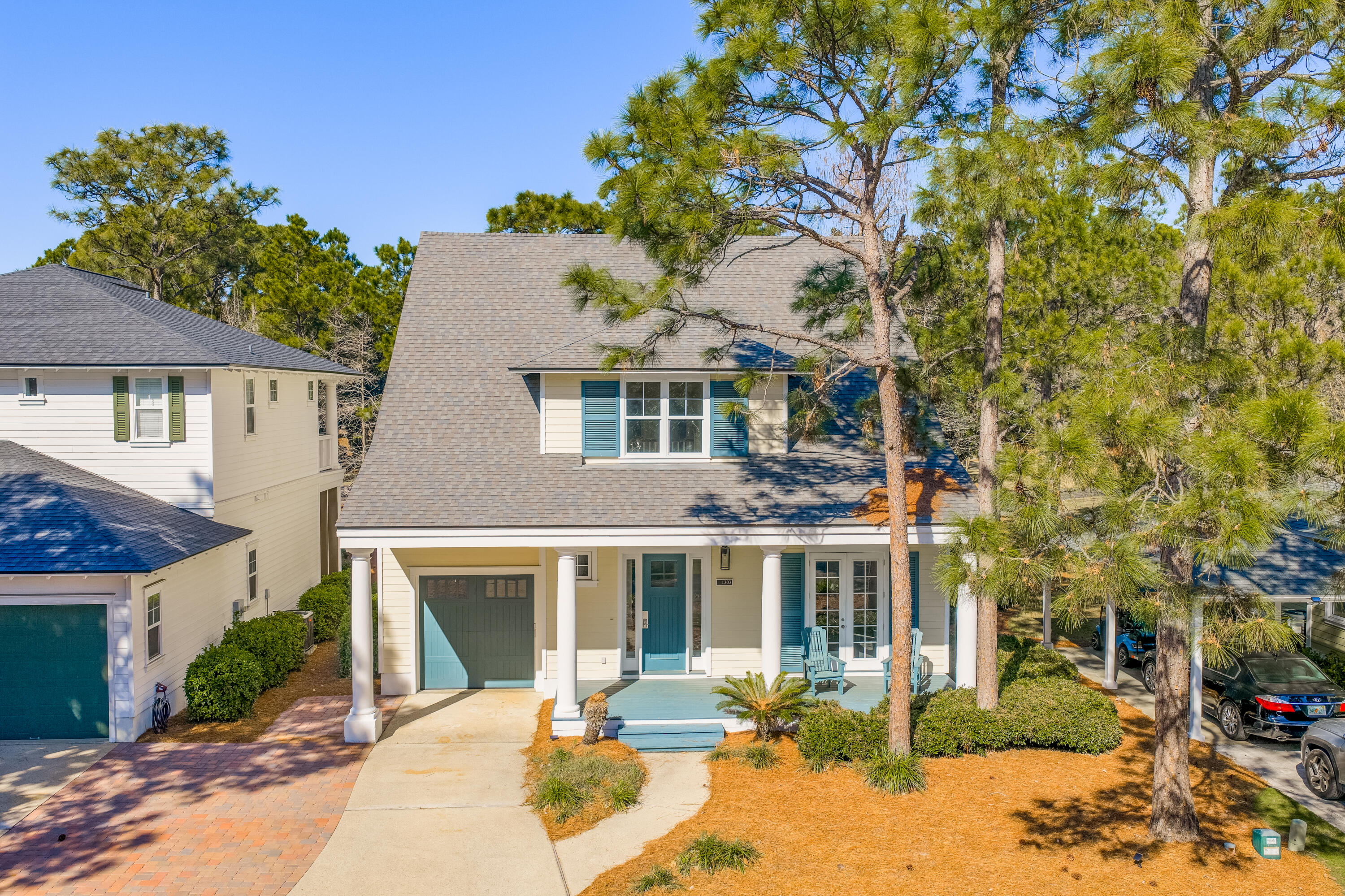 1303 Laurel Way Miramar Beach, FL 32550 - Photo 1 of 77 a front view of a house with a porch