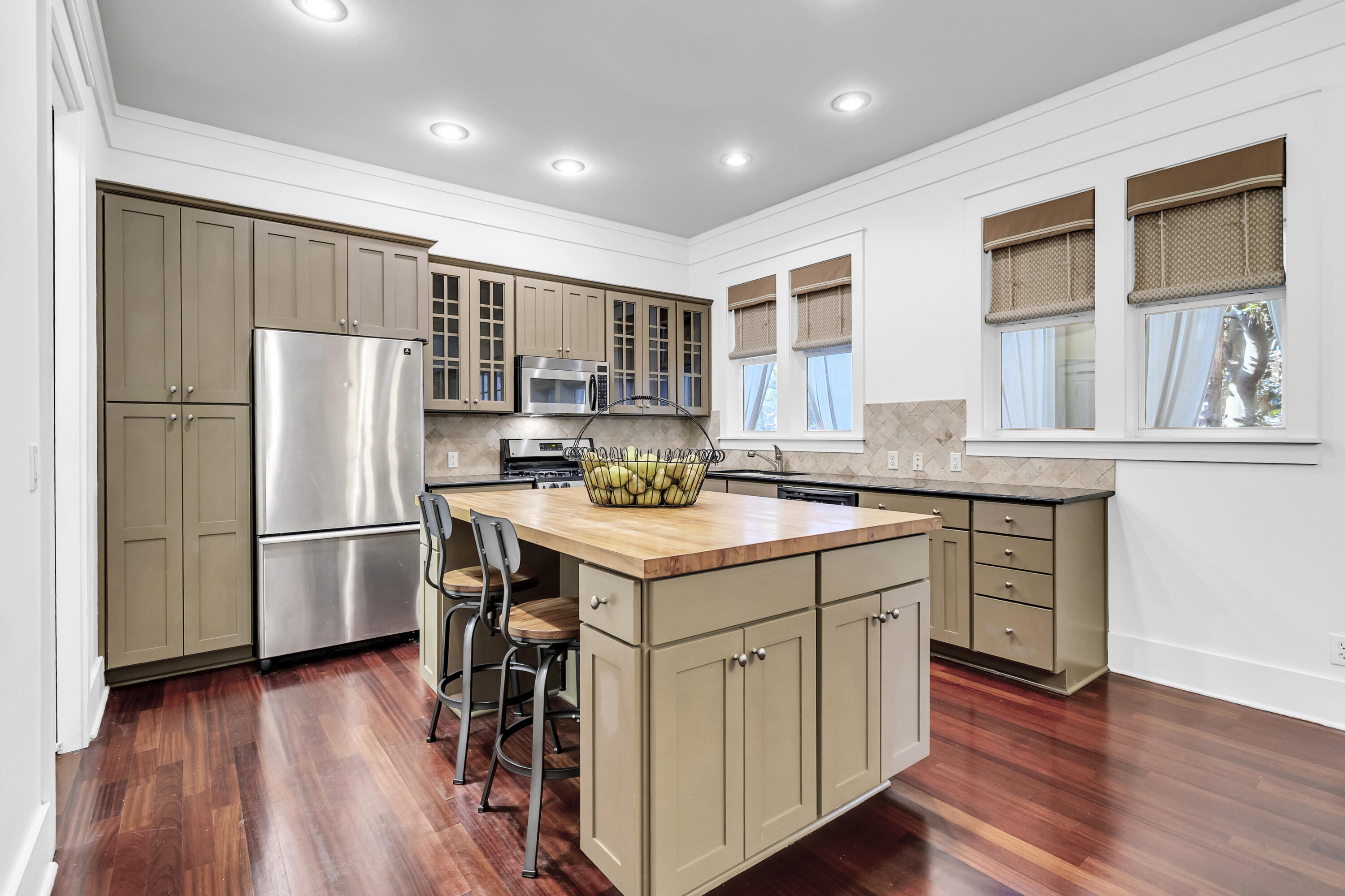 1303 Laurel Way Miramar Beach, FL 32550 - Photo 14 of 77 a kitchen with stainless steel appliances granite countertop a refrigerator a stove and a sink