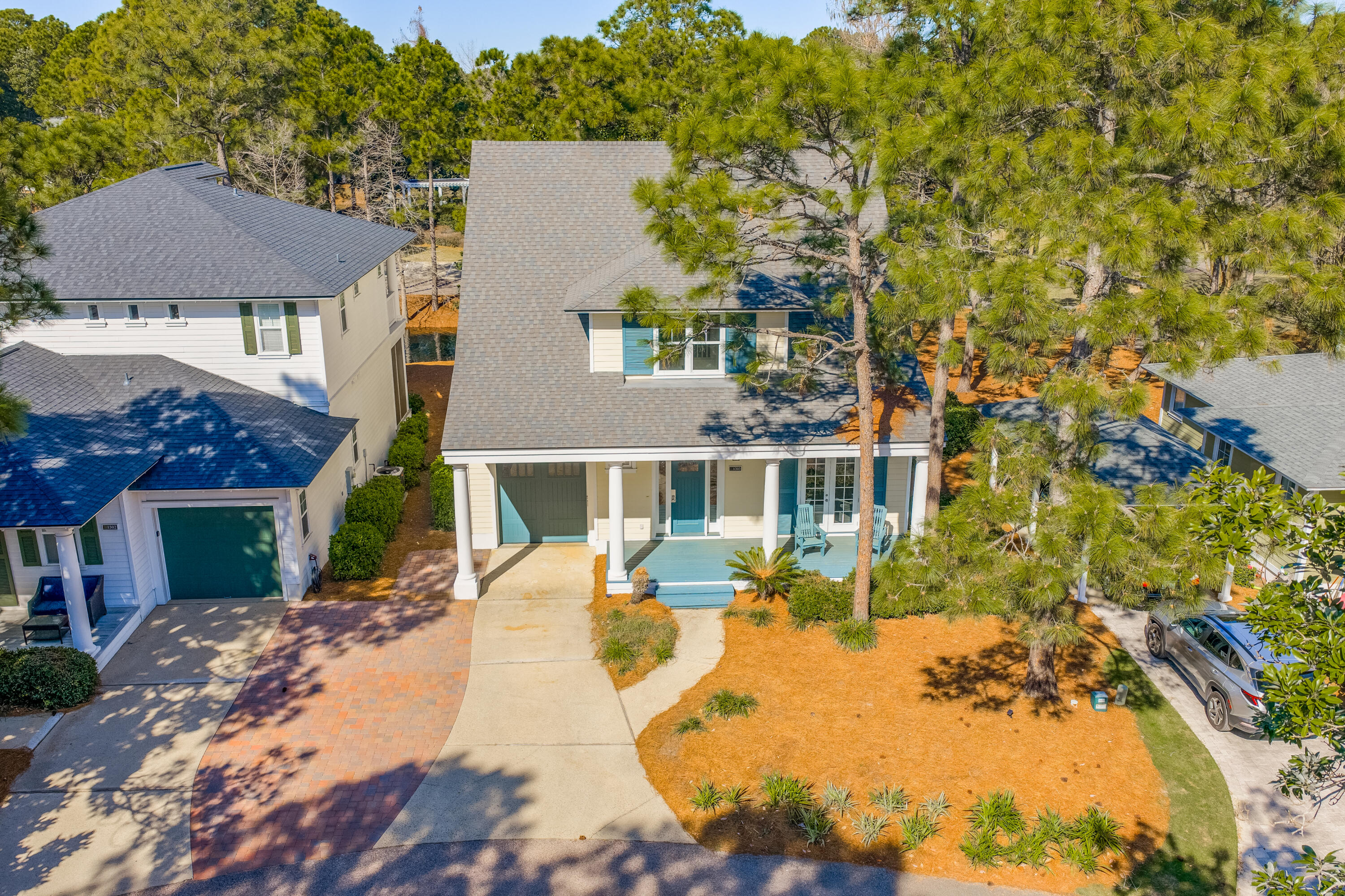 1303 Laurel Way Miramar Beach, FL 32550 - Photo 2 of 77 a view of a house with a yard