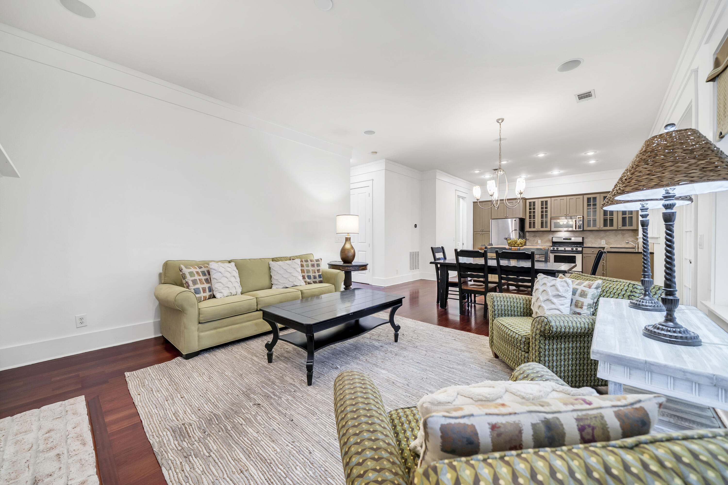 1303 Laurel Way Miramar Beach, FL 32550 - Photo 24 of 77 a living room with furniture and a wooden floor