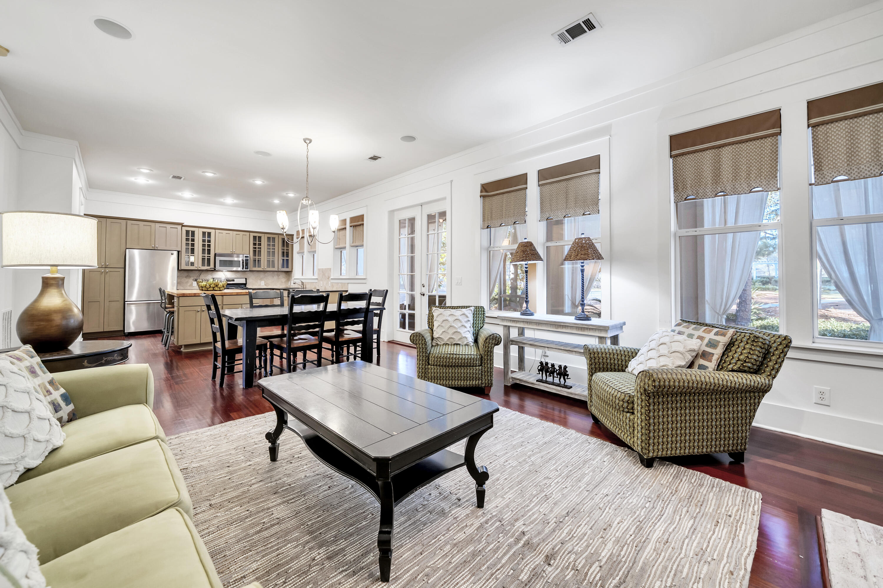 1303 Laurel Way Miramar Beach, FL 32550 - Photo 25 of 77 a living room with furniture and a table