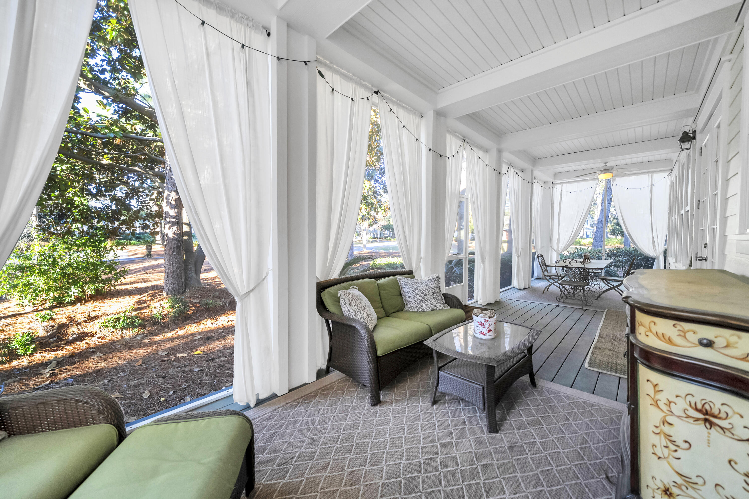 1303 Laurel Way Miramar Beach, FL 32550 - Photo 28 of 77 a living room with furniture and a large window