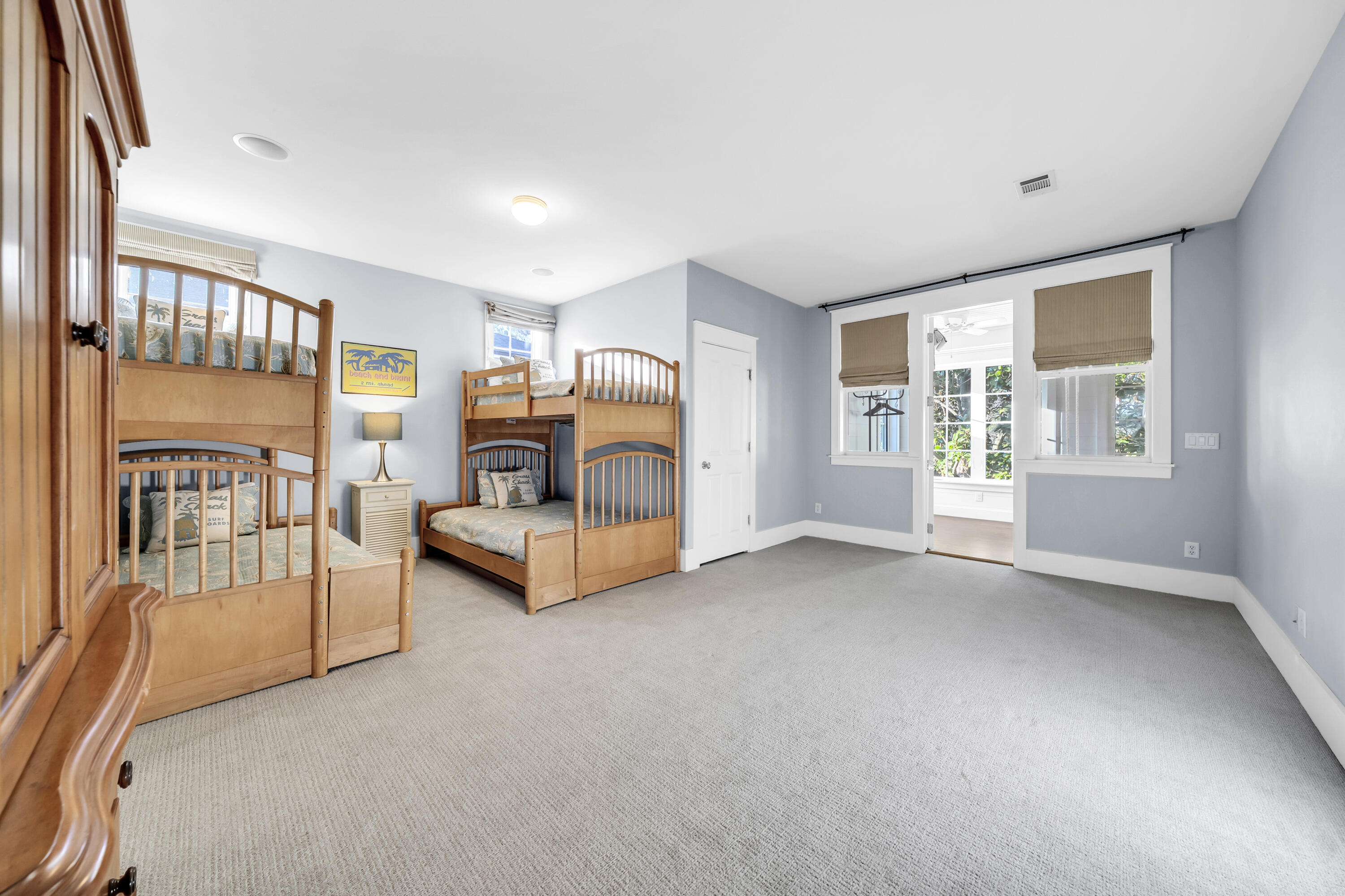 1303 Laurel Way Miramar Beach, FL 32550 - Photo 35 of 77 a view of a bedroom with furniture and windows
