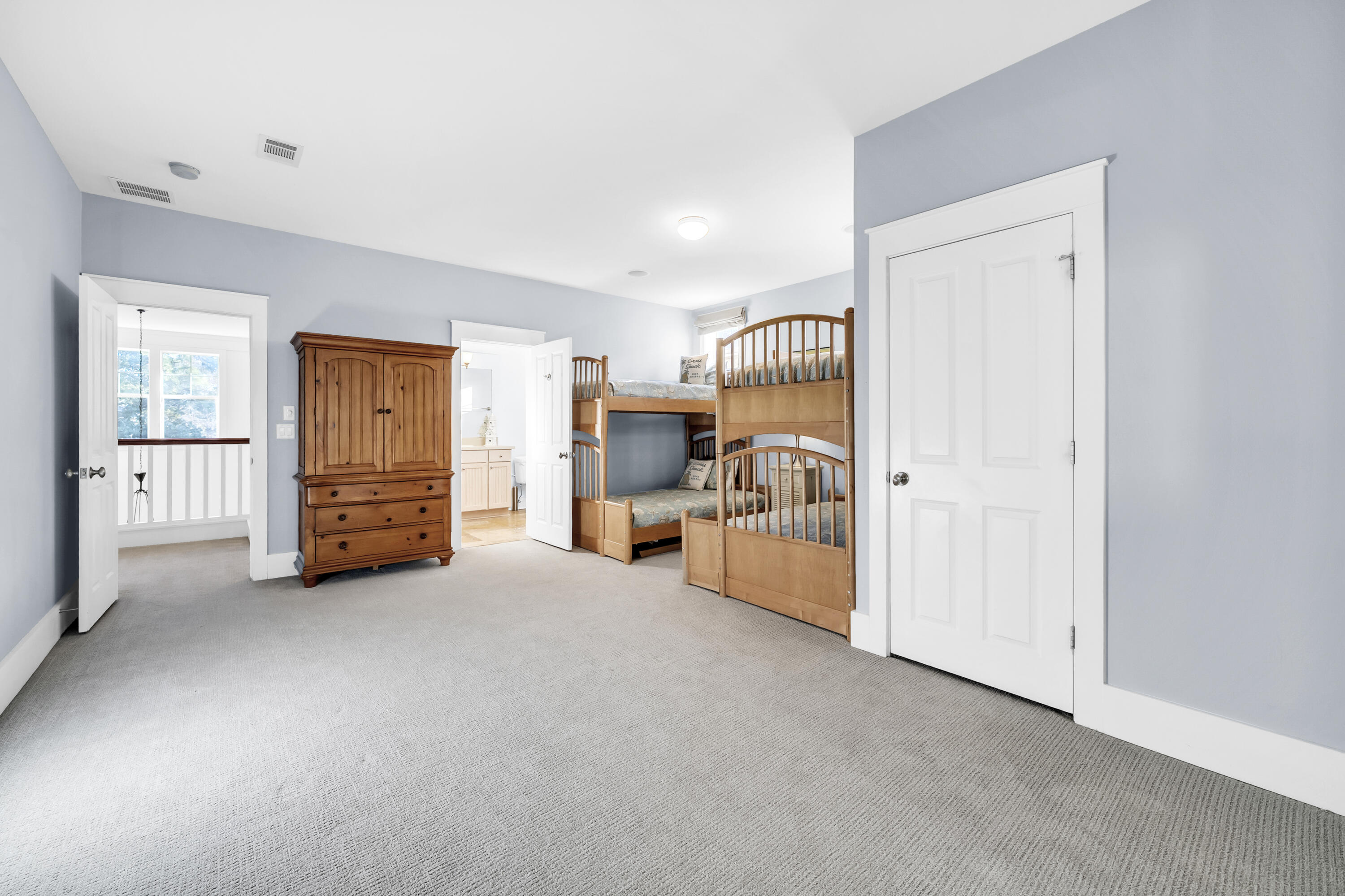 1303 Laurel Way Miramar Beach, FL 32550 - Photo 38 of 77 a view of a livingroom with furniture and a bedroom