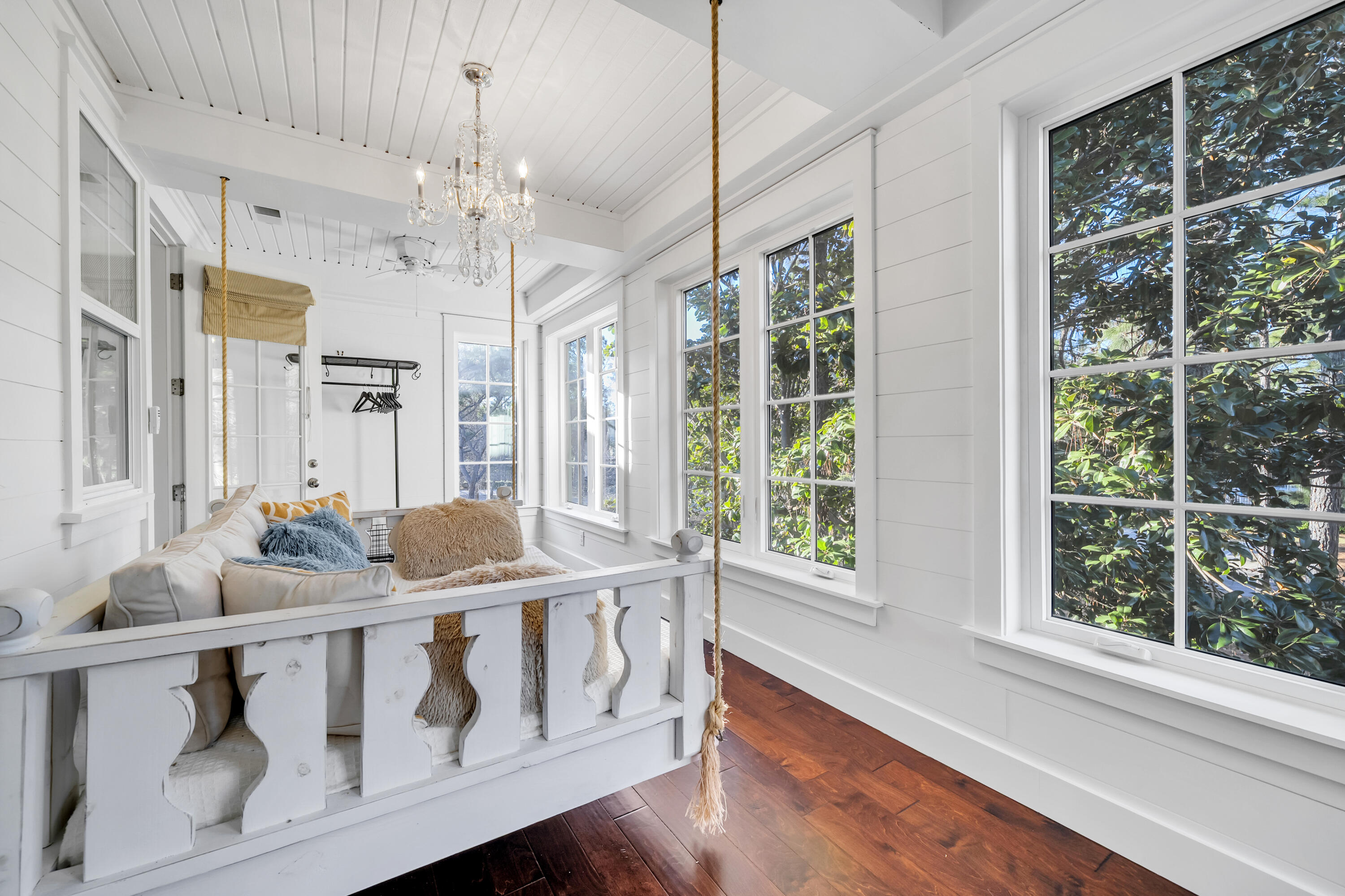 1303 Laurel Way Miramar Beach, FL 32550 - Photo 42 of 77 a view of a dining room with furniture window and wooden floor