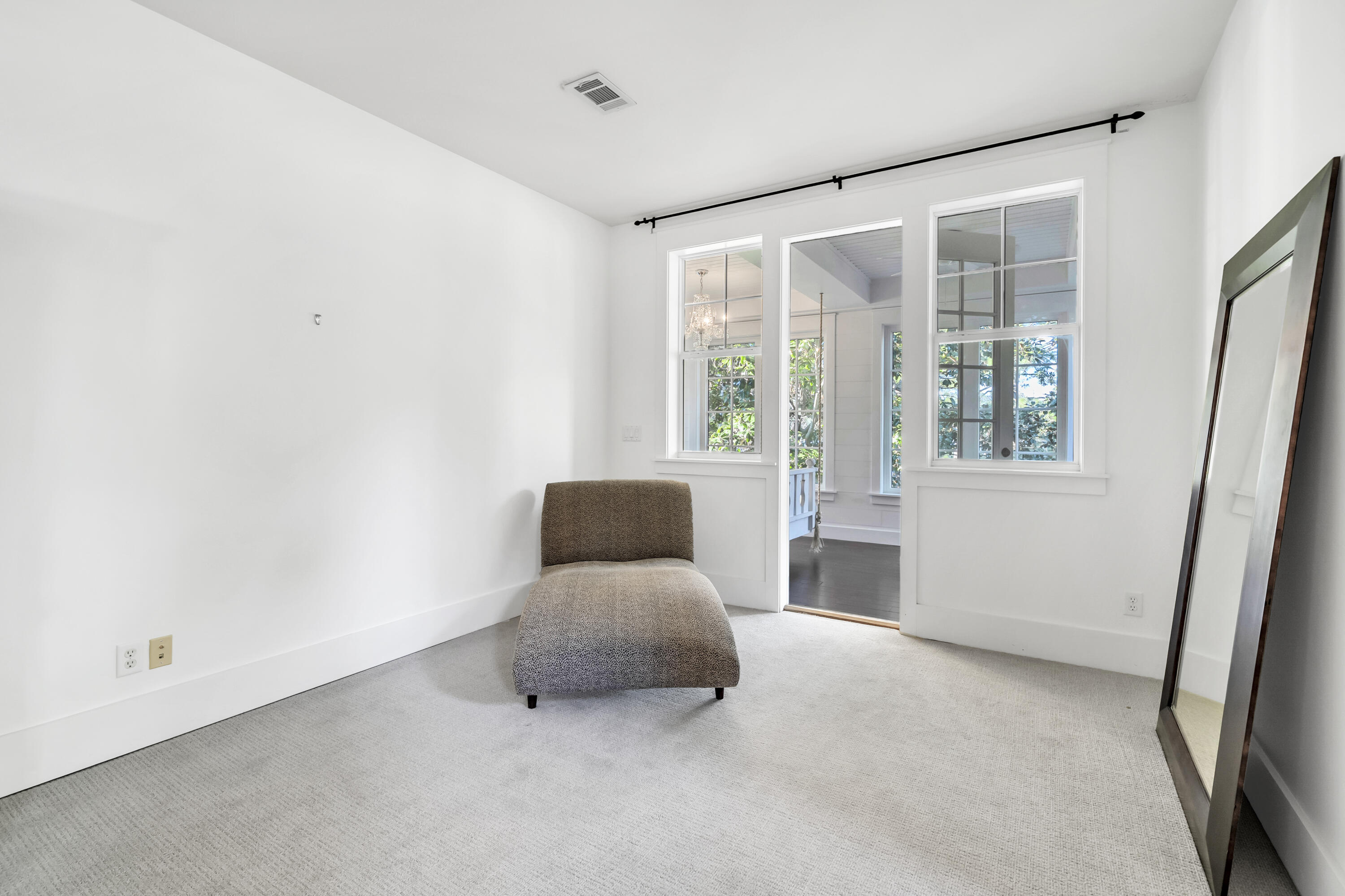 1303 Laurel Way Miramar Beach, FL 32550 - Photo 46 of 77 a living room with furniture and a large window