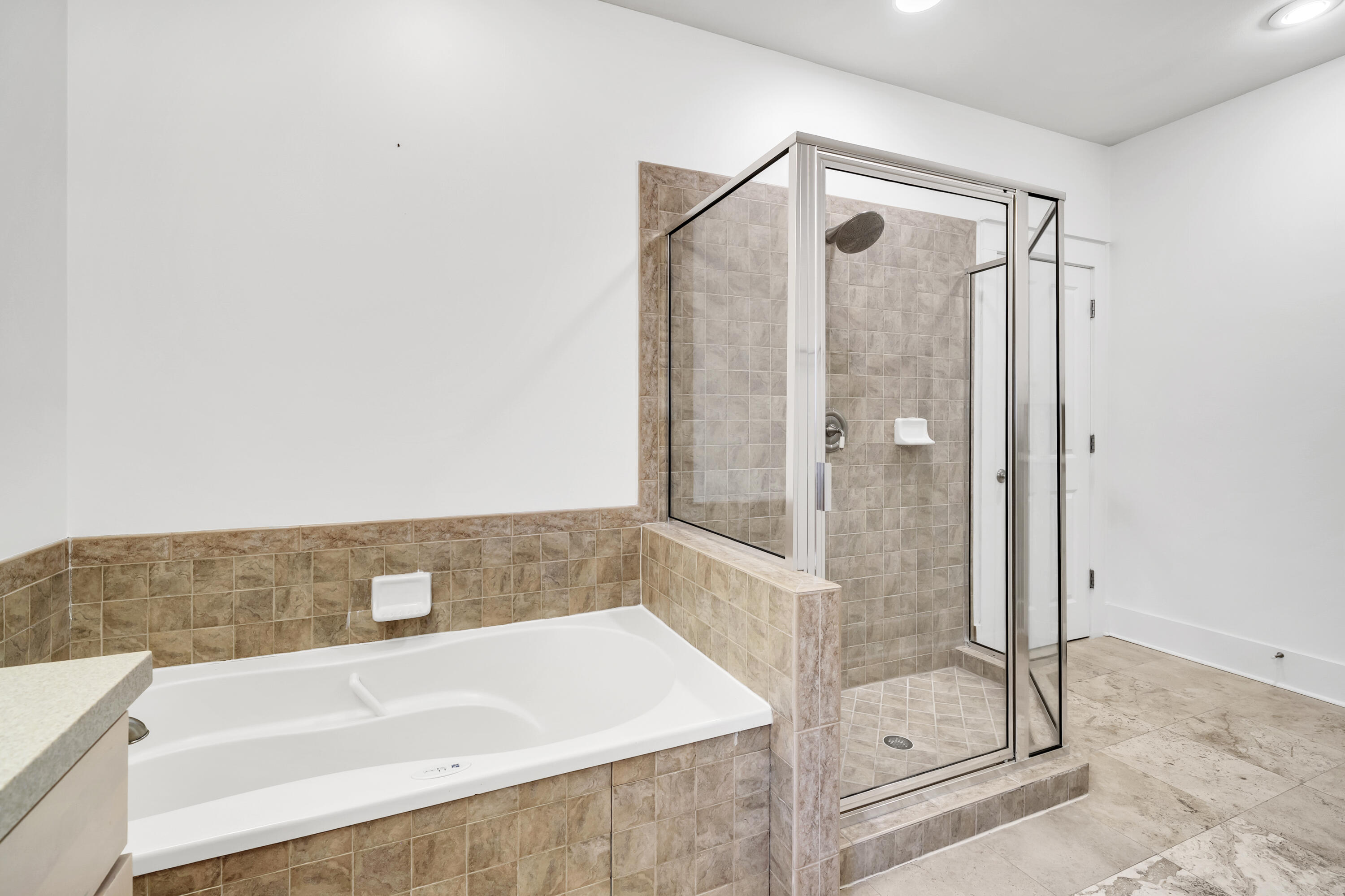 1303 Laurel Way Miramar Beach, FL 32550 - Photo 47 of 77 a bathroom with a tub and shower