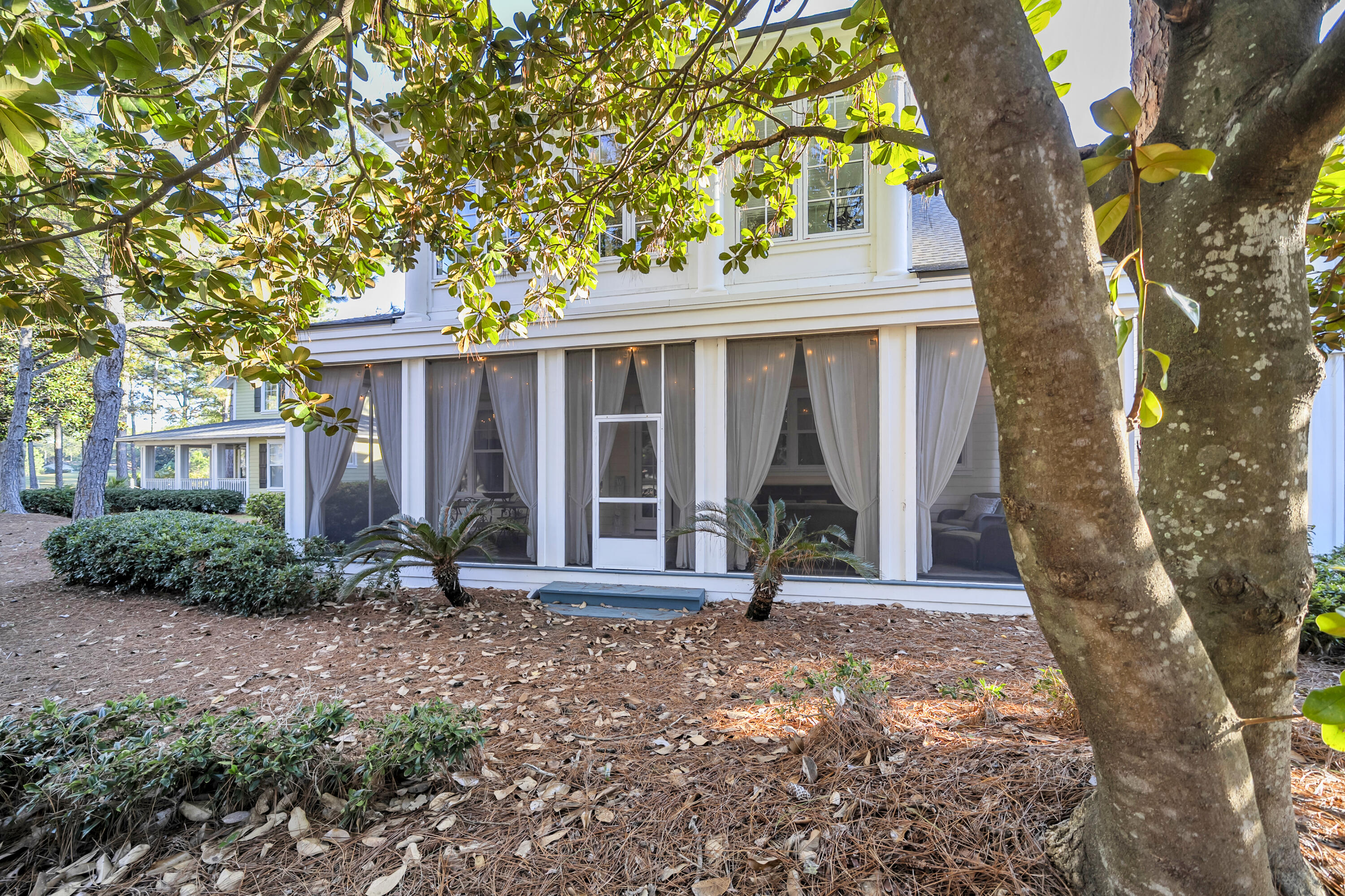 1303 Laurel Way Miramar Beach, FL 32550 - Photo 54 of 77 a view of a house with a tree in front