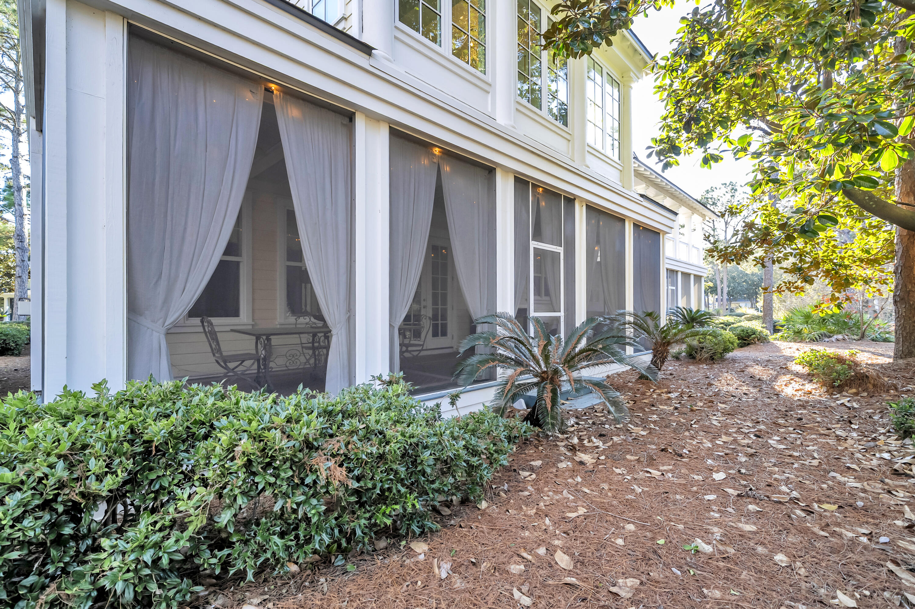 1303 Laurel Way Miramar Beach, FL 32550 - Photo 55 of 77 a view of a house with backyard and garden