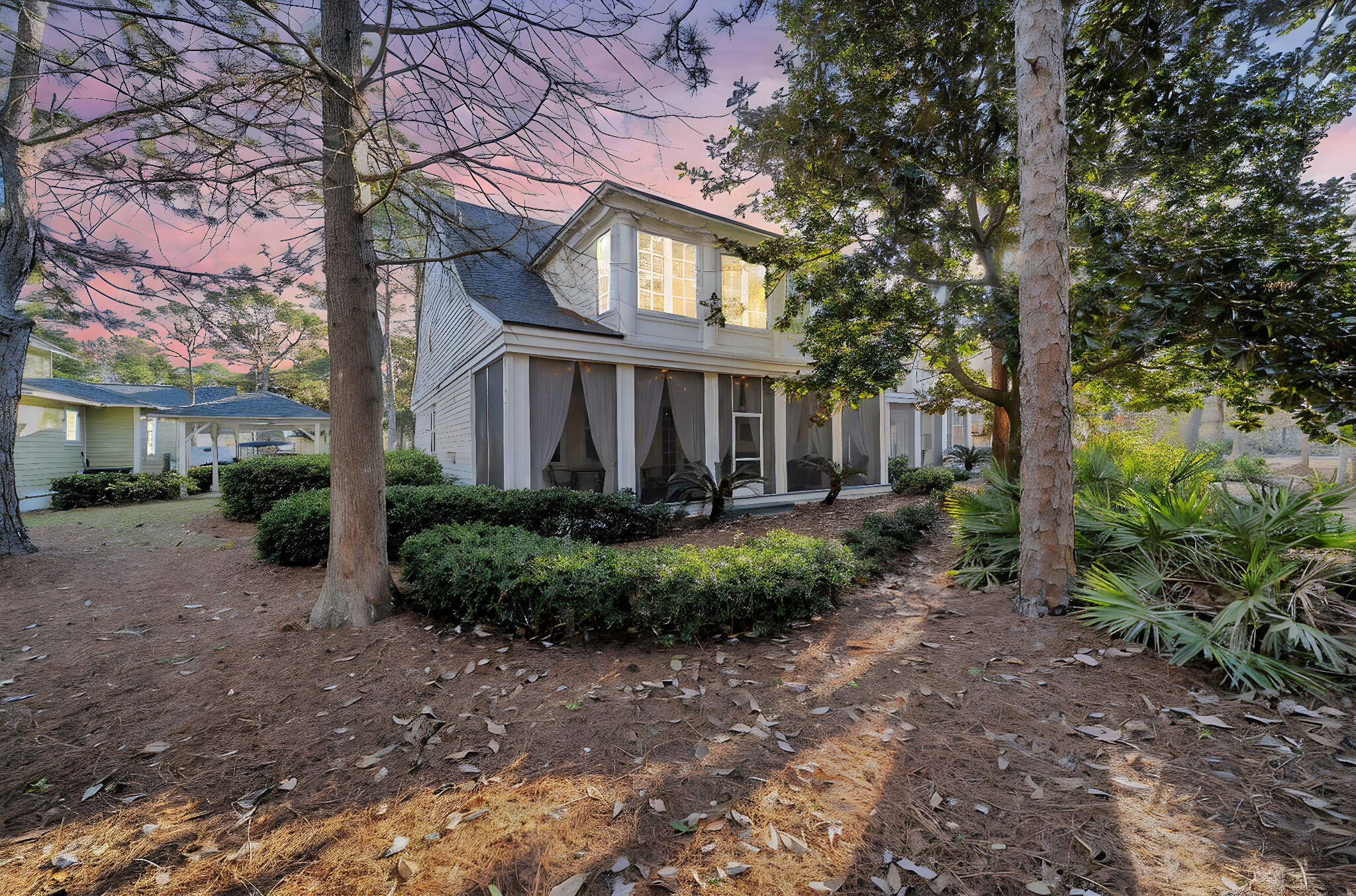 1303 Laurel Way Miramar Beach, FL 32550 - Photo 57 of 77 a front view of a house with garden