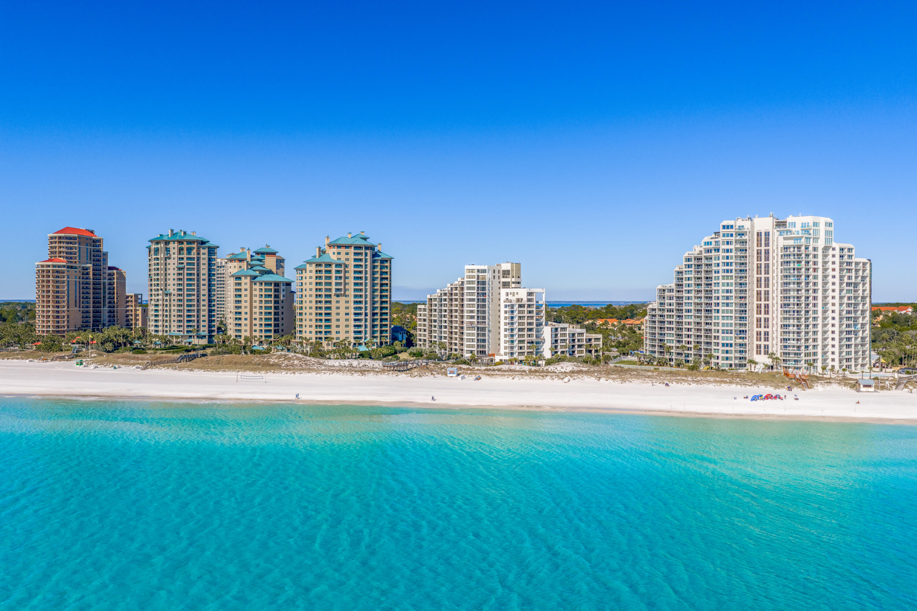 1303 Laurel Way Miramar Beach, FL 32550 - Photo 63 of 77 a view of a city with tall buildings and a big yard