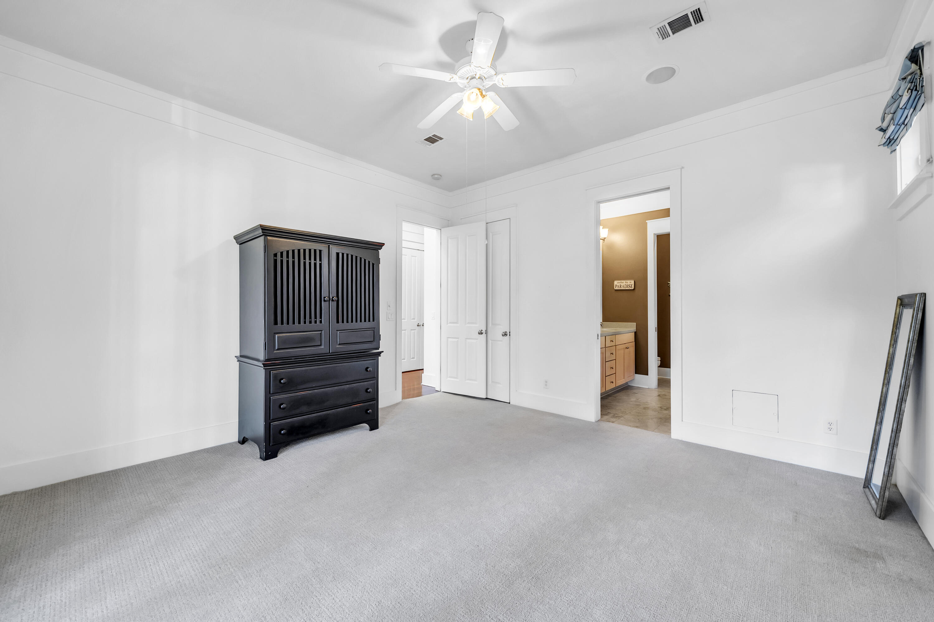 1303 Laurel Way Miramar Beach, FL 32550 - Photo 9 of 77 a view of room with closet and ceiling fan