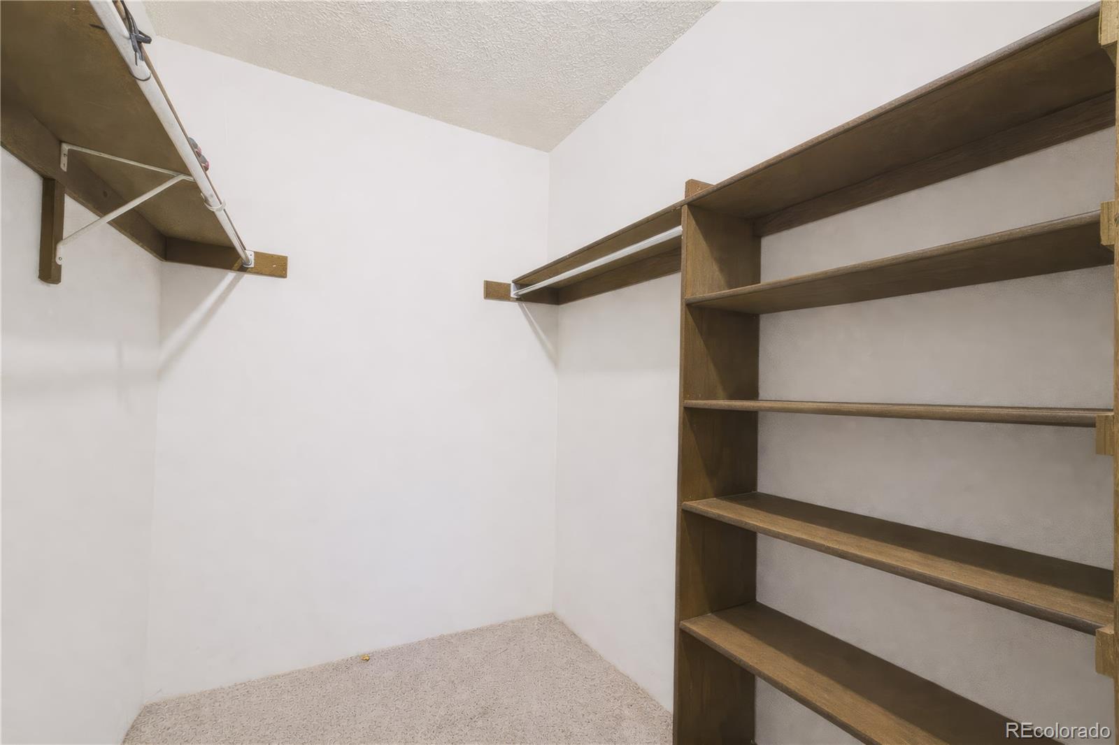 10251 West 44th Avenue, Unit 2203 Wheat Ridge, CO 80033 - Photo 11 of 20 a view of walk in closet