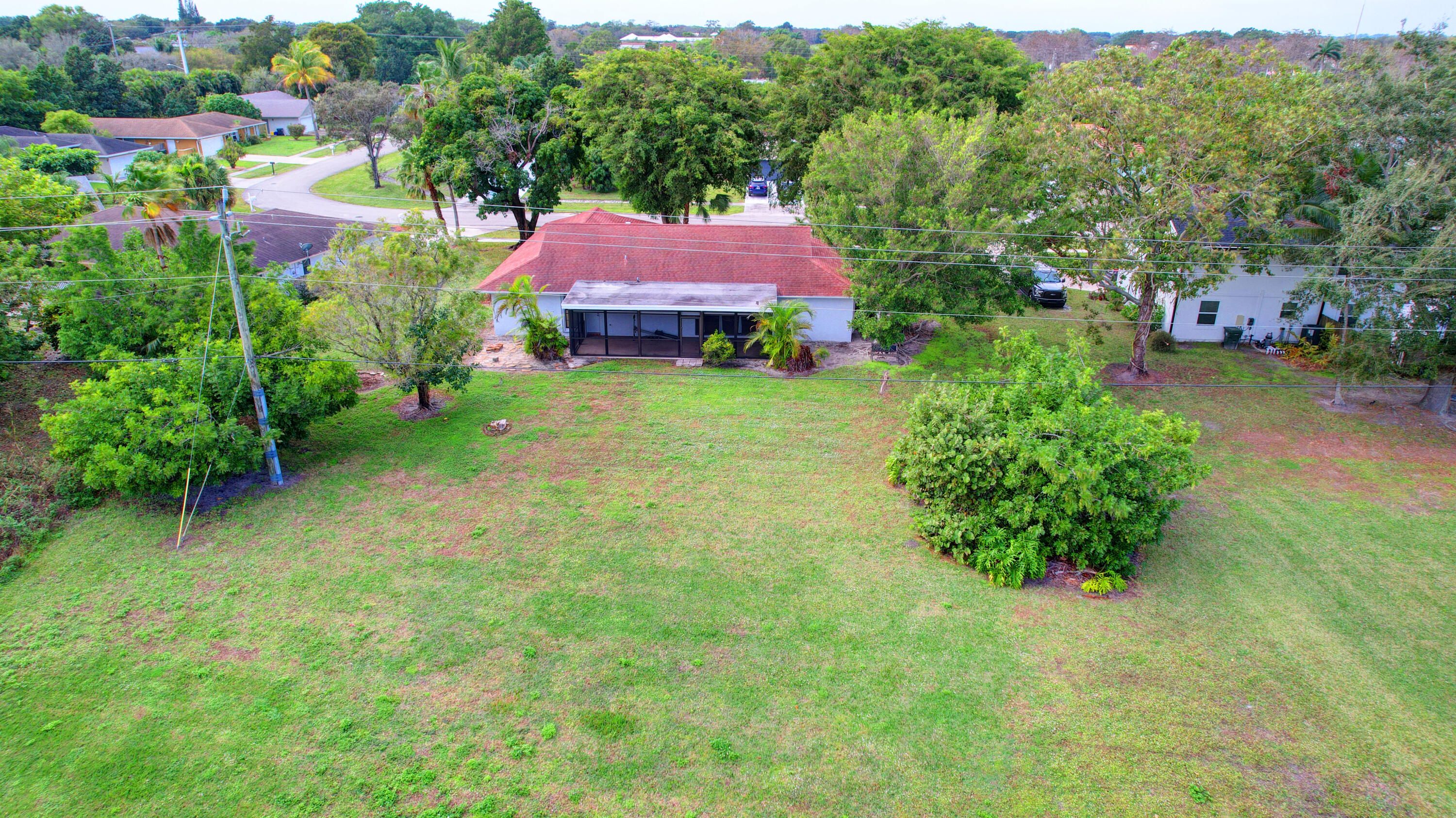 1941 Shower Tree Way Wellington, FL 33414 - Photo 28 of 36 12_house air (12)