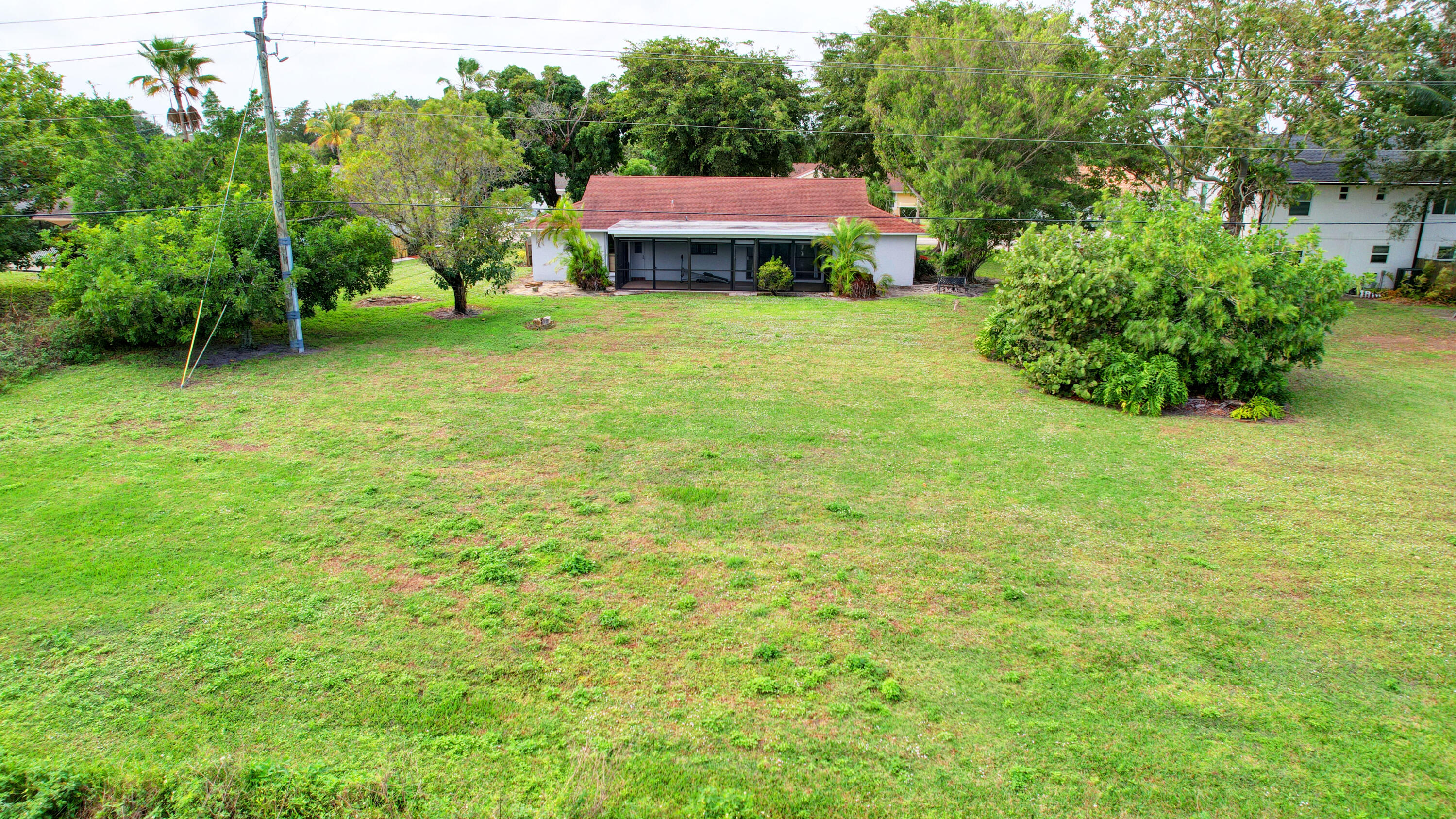 1941 Shower Tree Way Wellington, FL 33414 - Photo 29 of 36 13_house air (13)