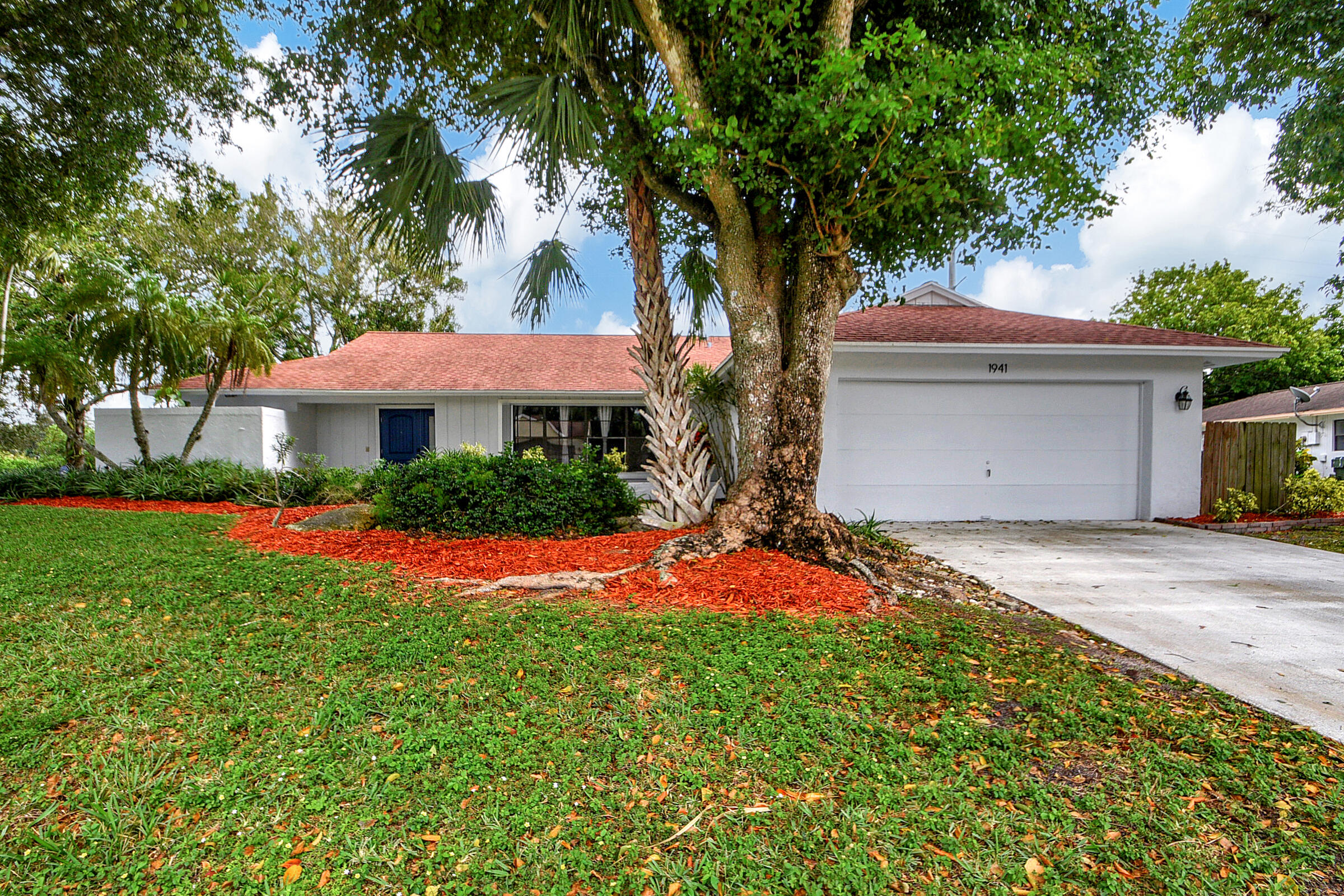 1941 Shower Tree Way Wellington, FL 33414 - Photo 3 of 36 14_house (1)