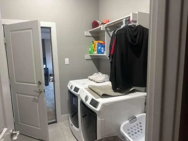 a view of a kitchen from a hallway