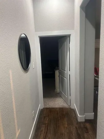 a bedroom with a bed and a cabinets