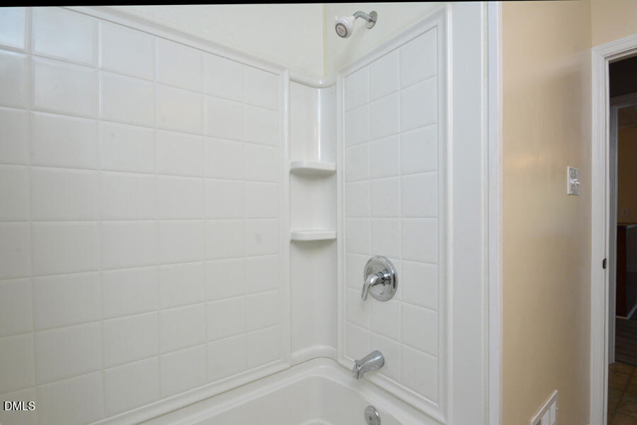 721 Peyton Avenue Durham, NC 27703 - Photo 15 of 25 a bathroom with a shower