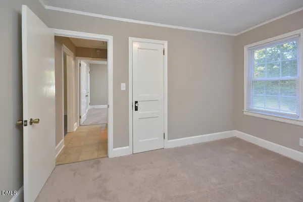 wooden floor and closet in a room