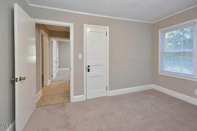 wooden floor and closet in a room