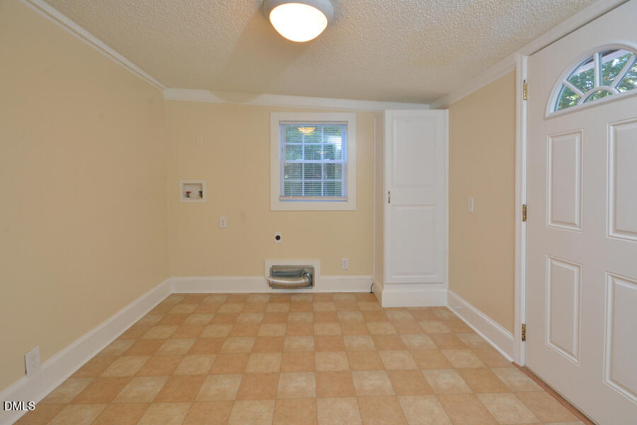 721 Peyton Avenue Durham, NC 27703 - Photo 19 of 25 a view of an empty room with a window