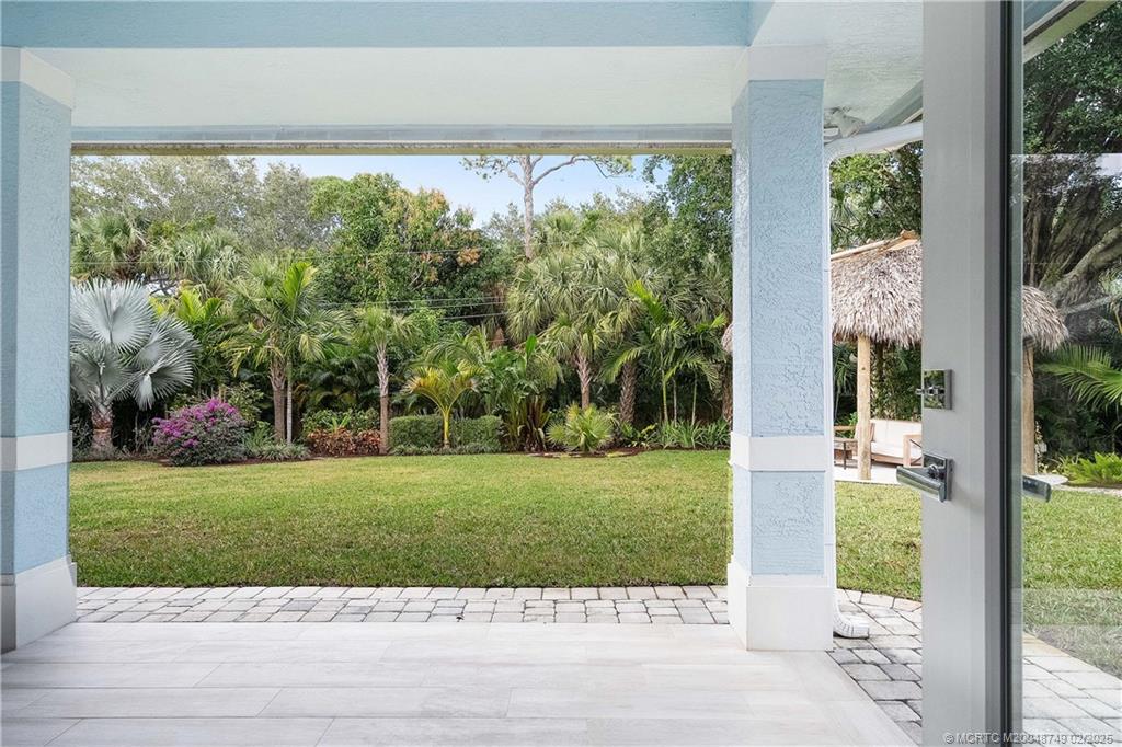 1269 Northwest Fork Road Stuart, FL 34994 - Photo 26 of 92 a view of a garden from a window