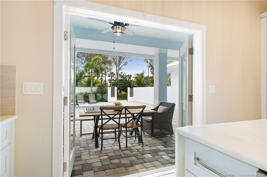 1269 Northwest Fork Road Stuart, FL 34994 - Photo 31 of 92 a view of a dining room with furniture window and outside view