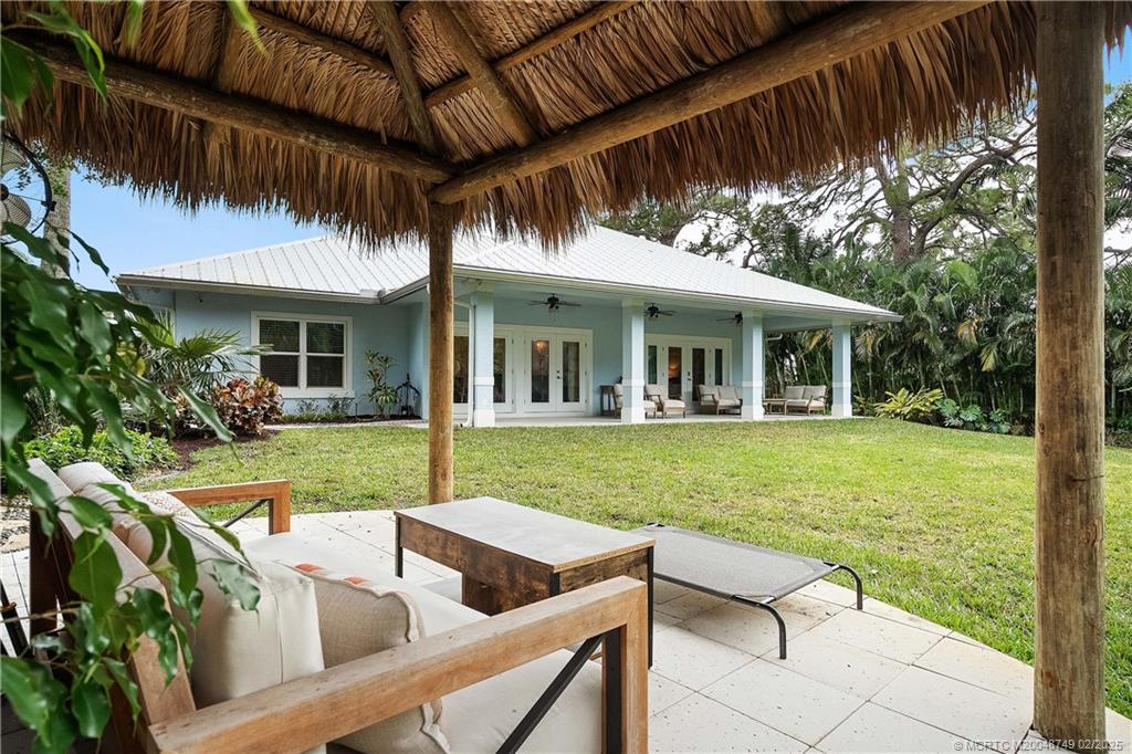 1269 Northwest Fork Road Stuart, FL 34994 - Photo 59 of 92 a view of house with backyard and swimming pool