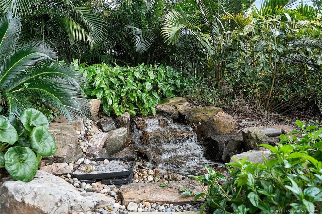 1269 Northwest Fork Road Stuart, FL 34994 - Photo 60 of 92 a view of a garden with plants