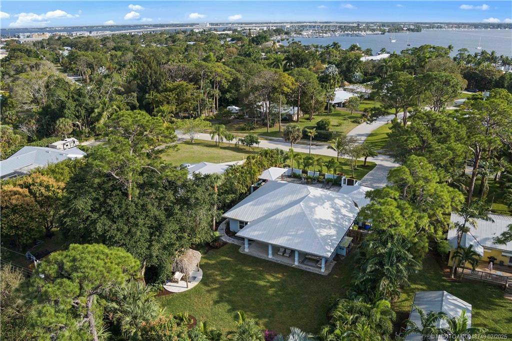 1269 Northwest Fork Road Stuart, FL 34994 - Photo 75 of 92 an aerial view of a house with yard