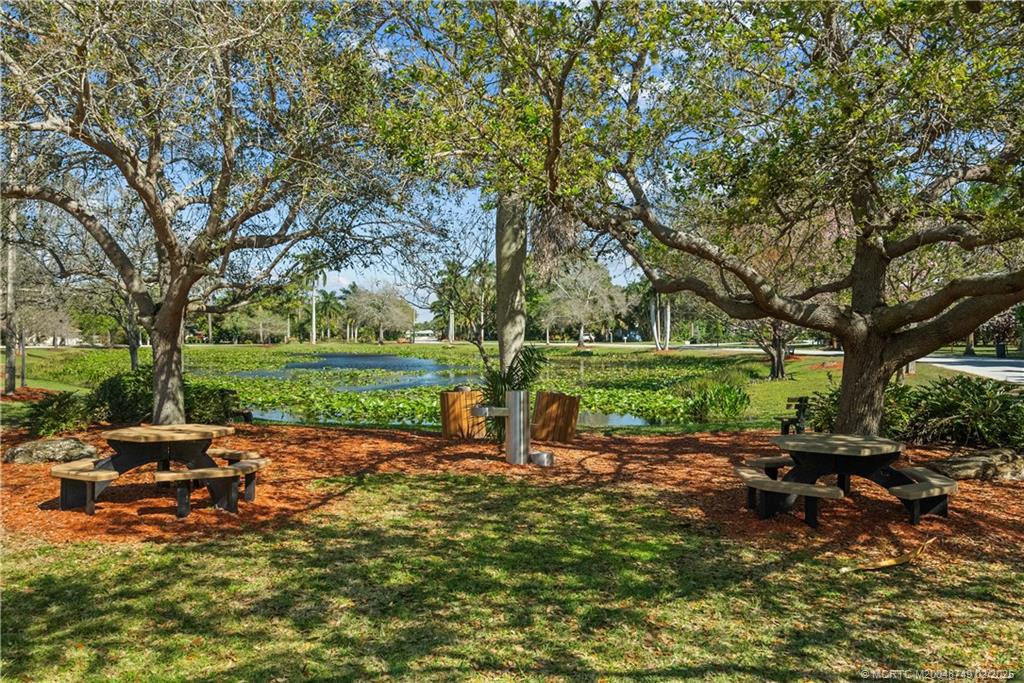 1269 Northwest Fork Road Stuart, FL 34994 - Photo 89 of 92 a view of a park with large trees