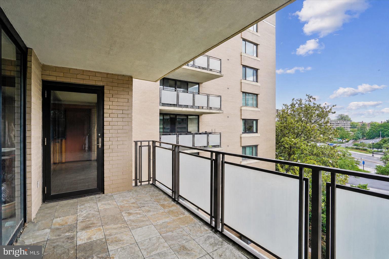 800 25th Street Northwest, Unit 504 Washington, DC 20037 - Photo 50 of 52 Spacious balcony with city views.