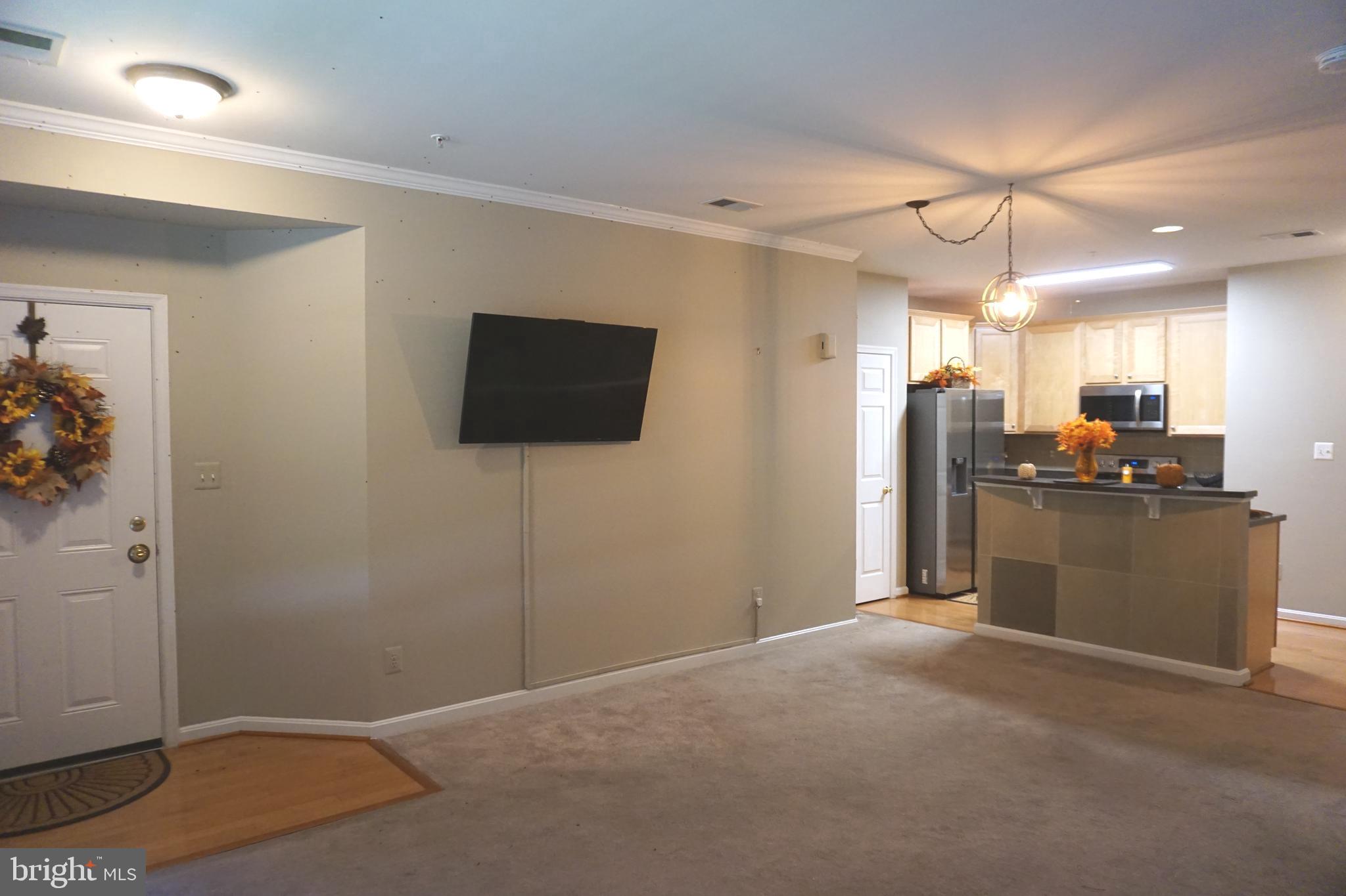 1670 Mohegan Drive, Unit A Havre de Grace, MD 21078 - Photo 9 of 44 Plush carpet & Crown molding