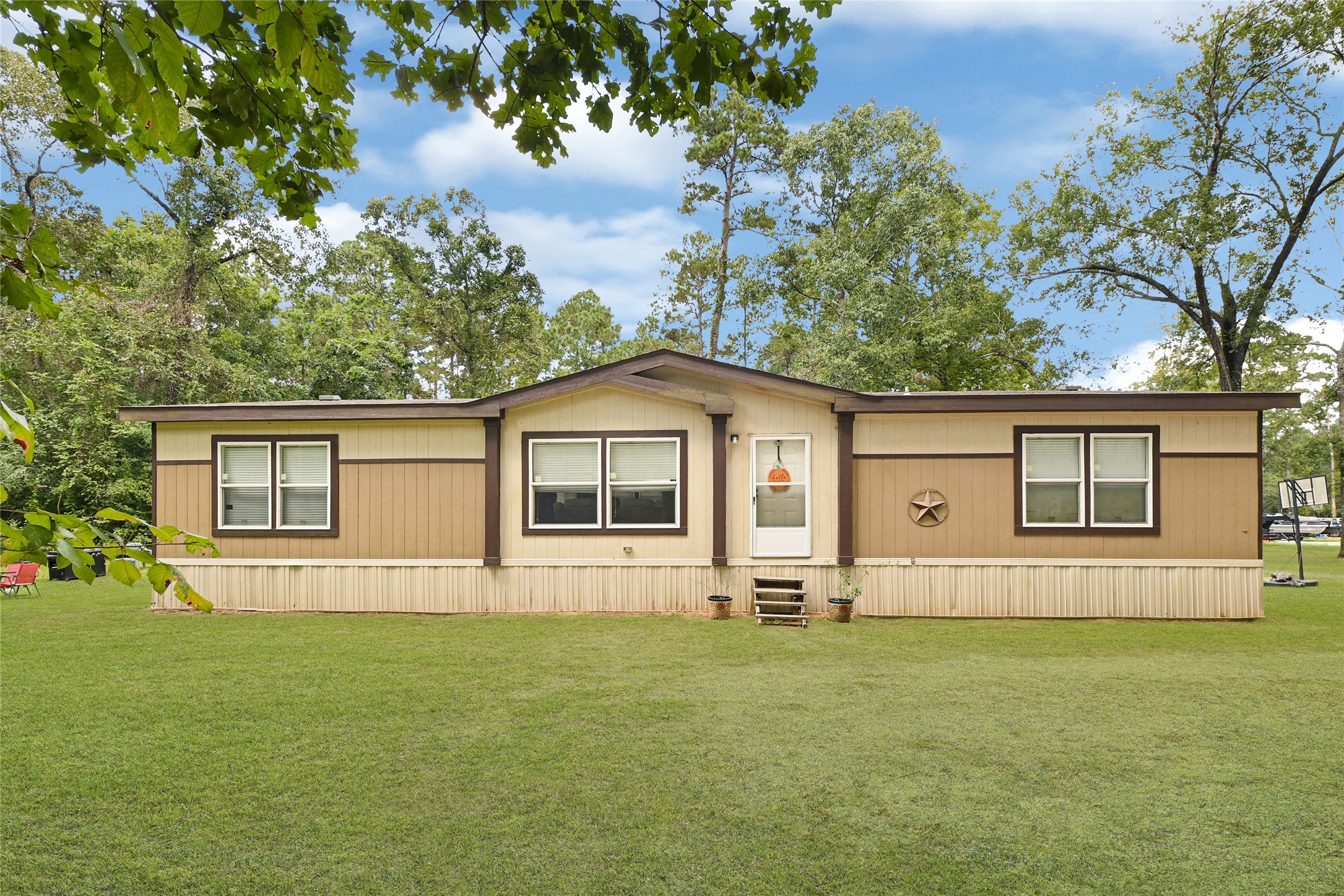 635 County Road 2175 Shepherd, TX 77371 - Photo 1 of 27 a front view of house with yard
