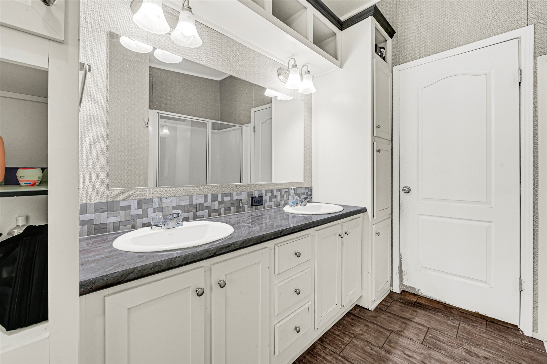 635 County Road 2175 Shepherd, TX 77371 - Photo 15 of 27 a bathroom with a sink a vanity and a mirror