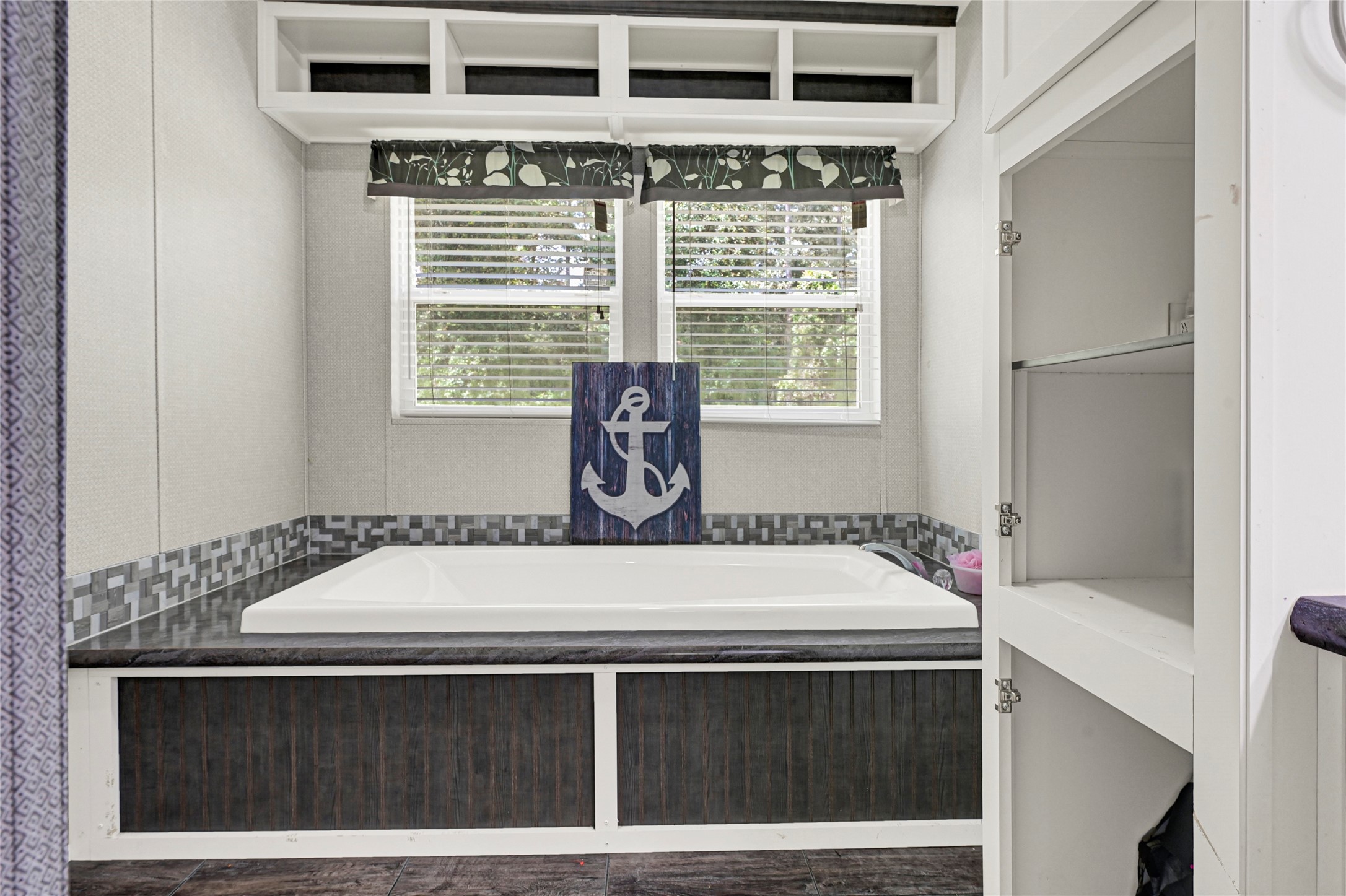 635 County Road 2175 Shepherd, TX 77371 - Photo 16 of 27 a bathroom with a sink and a mirror
